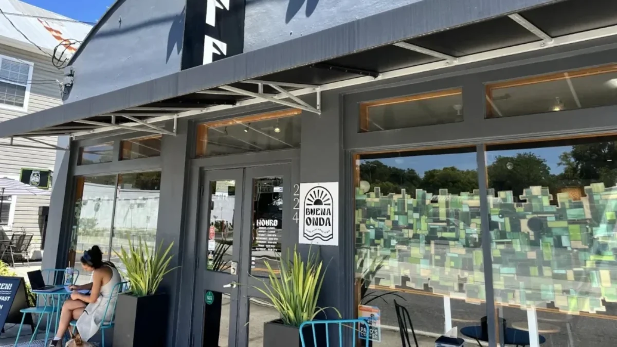 a woman dines outside Buena Onda on West King Street