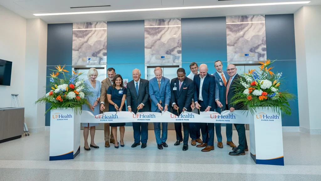 University of Florida and UF Health officials cut a ceremonial ribbon at the opening of a new UF Health hospital in St. Johns County's Durbin Park.