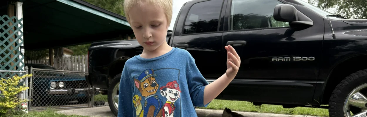 Dog bite victim Roland Moore in his driveway