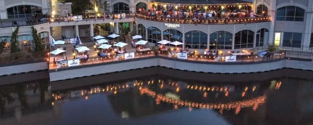Tables on the waterfront at Pusser's Caribbean Bar & Grille