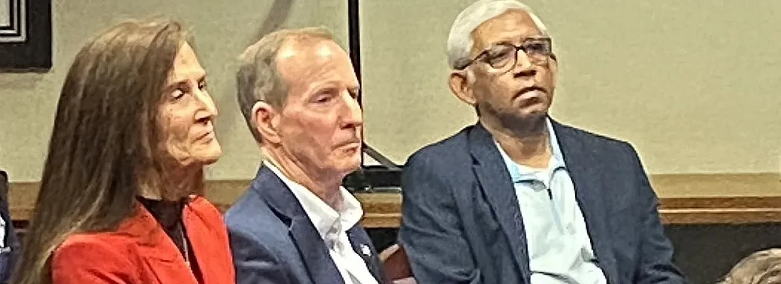 Three JEA leaders sitting at a news conference. From left are former JEA CEO Vicky Cavey, former JEA Board Chair Joseph DiSalvo and city Chief of Analytics Parvez Ahmed.