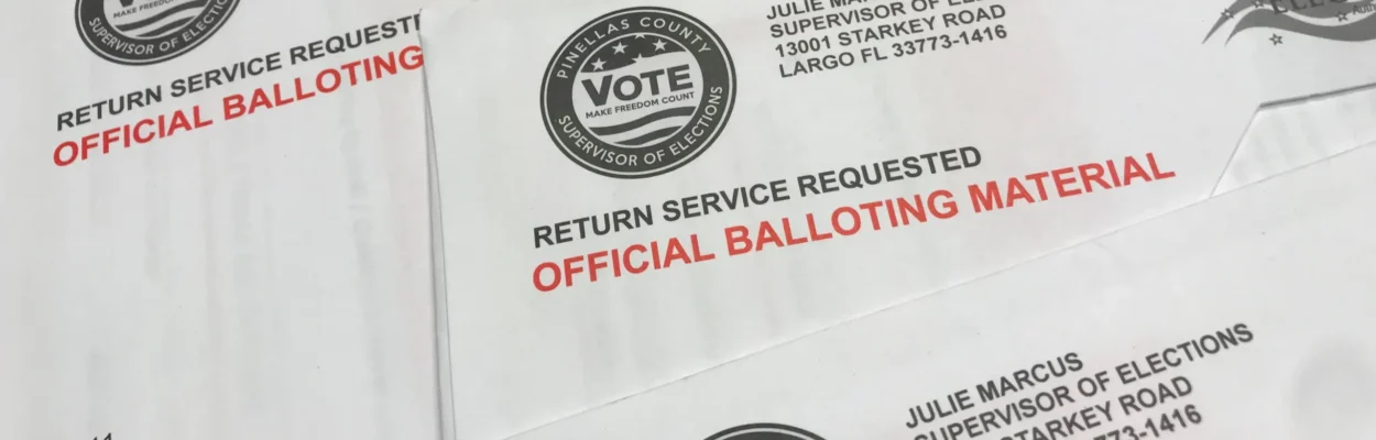 A stack of mail-ini ballots. This election, the ballot will include three amendments.