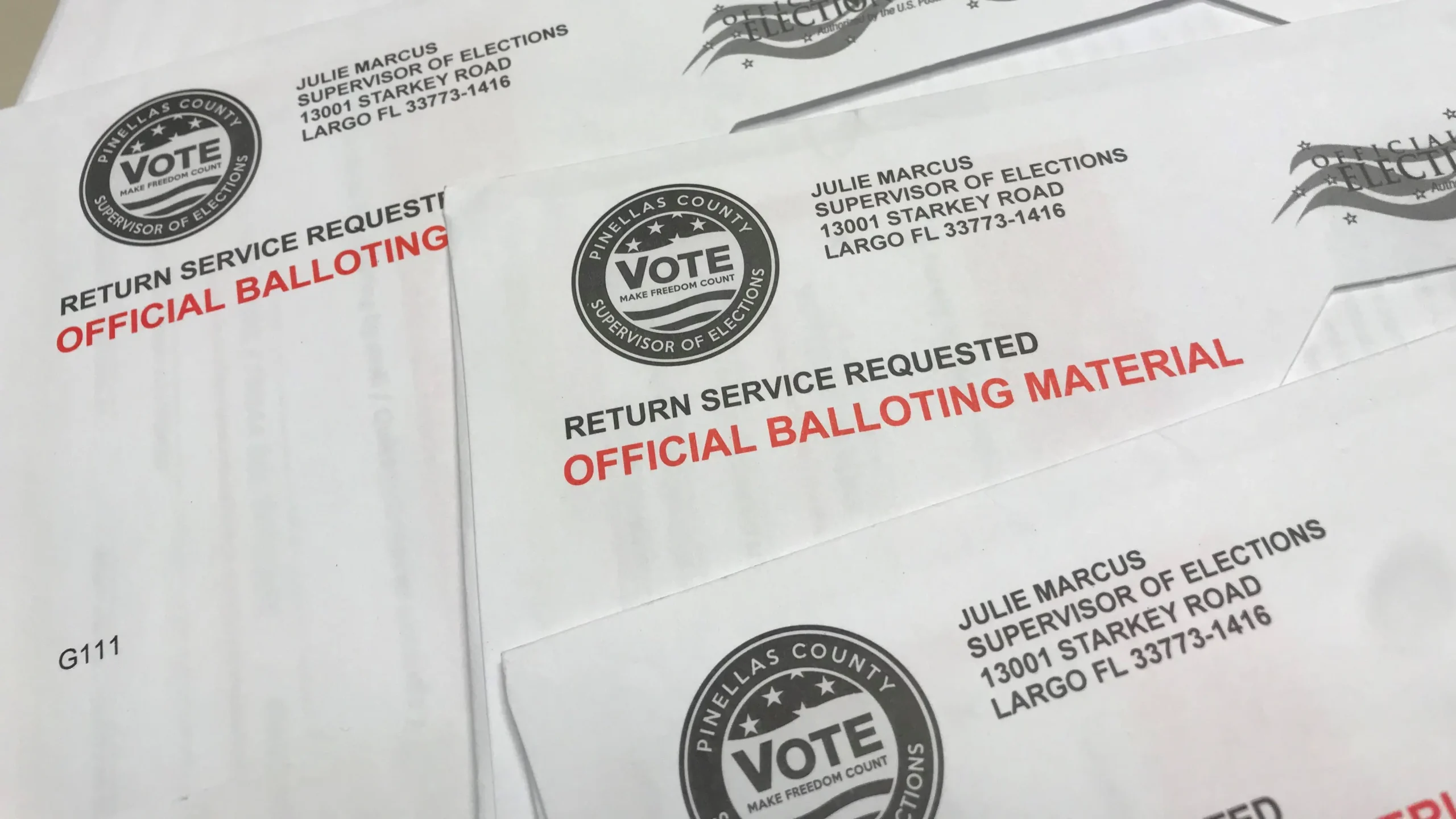 A stack of mail-ini ballots. This election, the ballot will include three amendments.