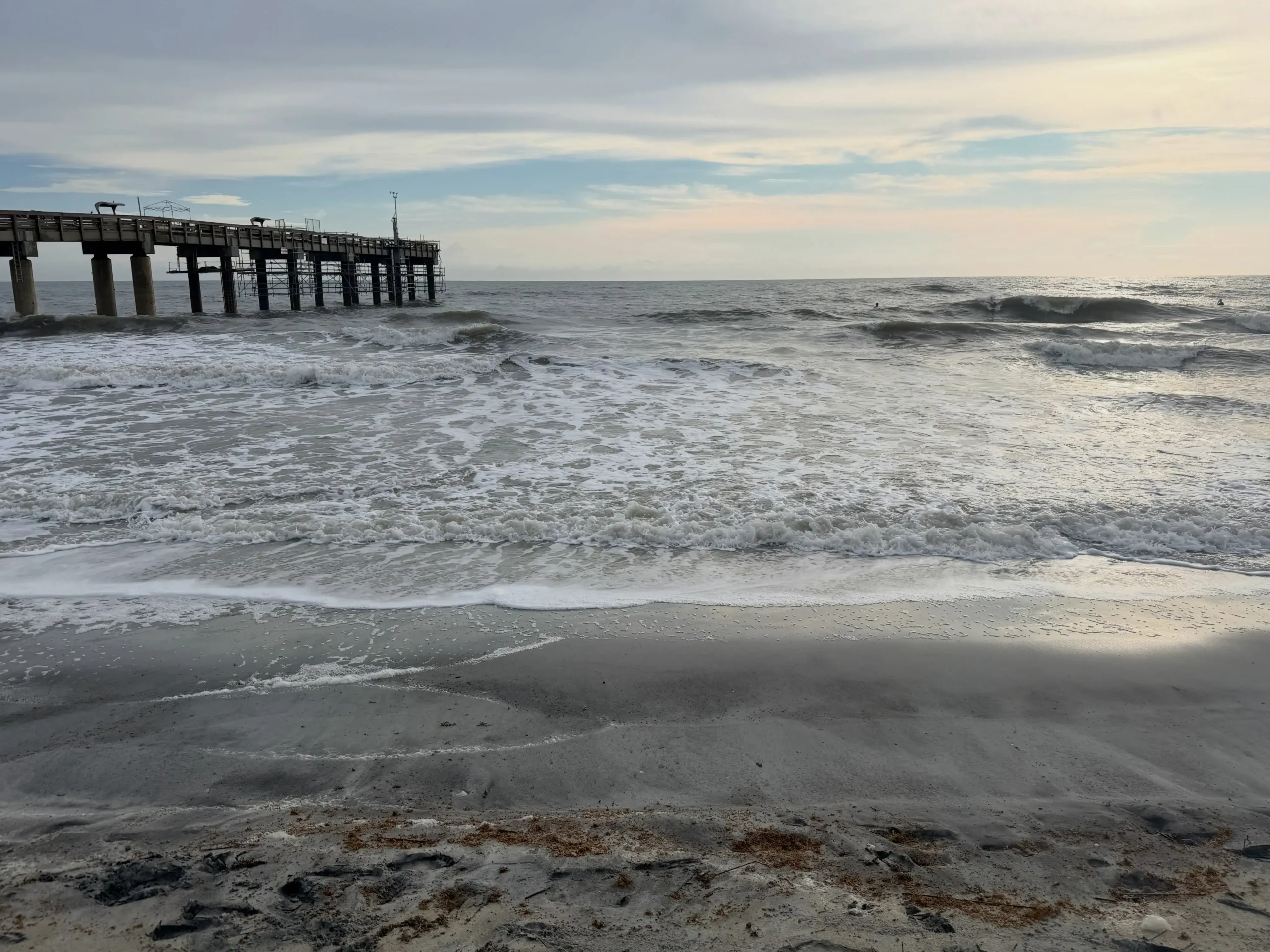 Photo of rough surf along St. Augustine Beach. Flooding also is possible.