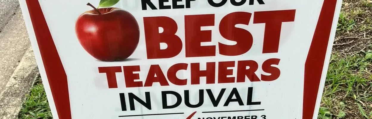 A sign supporting the 1-mill tax extension that reads "keep our best teachers in Duval"